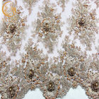 Koralikowa suknia ślubna Koronkowa tkanina Szerokość 135 cm Ręcznie haftowana 1 jard