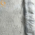 Piękna biała haftowana tkanina z koronki z brokatem MDX 20 (poliester na sukienki)