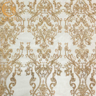 Koronkowa tkanina z koronki poliestrowej ze złotymi koralikami na tekstylia domowe